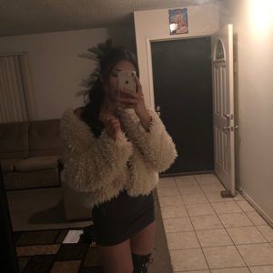 Cute oversize furry jacket.